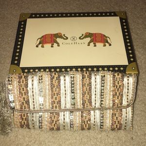 Cole Haan beaded jewelry roll